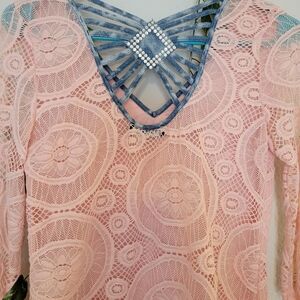 Pink Lace Top, Jean details, and transparent in the Back.